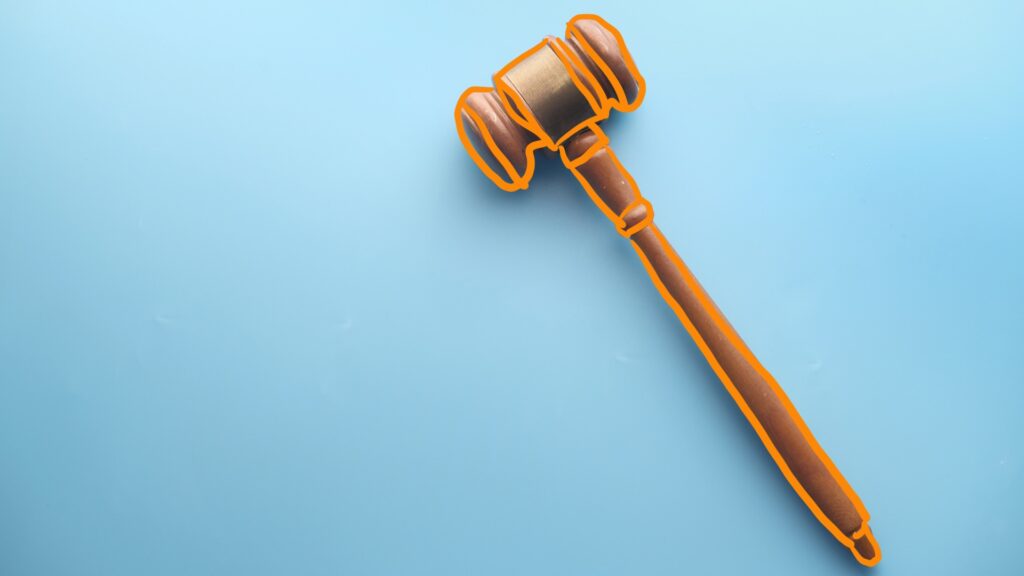 Gavel with blue background