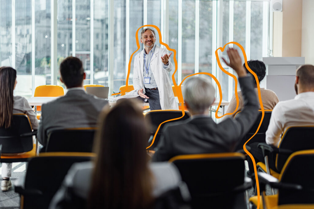 Decorative stock photo of a medical professional presenting at a conference